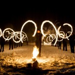 Fire performers spwinging fire poi form a spectacular part of the Imbolc Festival